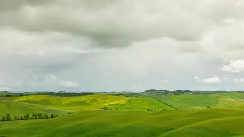 Time lapse of the clouds over the hills of Tuscany Italy Stock-Footage 249415998