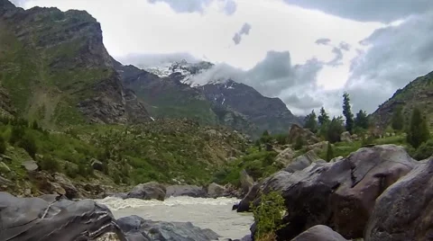 Time Lapse of Clouds over a Himalayan Mountain and River Video stock 51807193