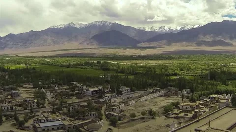 Time Lapse of Clouds over Himalayan Mountains and Green Valley Video stock 51847820