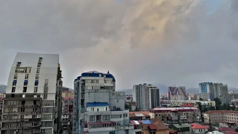 Time-lapse clouds over houses Stock Footage 164040627