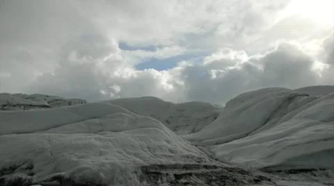Time-lapse of clouds over an icy landscape in Alaska, USA  Stock Footage 12757443