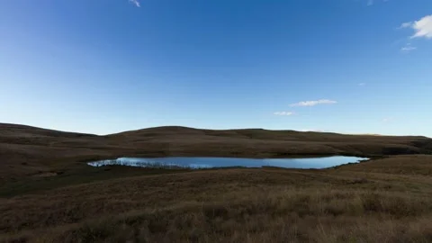 Time lapse of clouds over Kamloops dam at Highmoor in Maloti Drakensberg Stock Footage 155386988