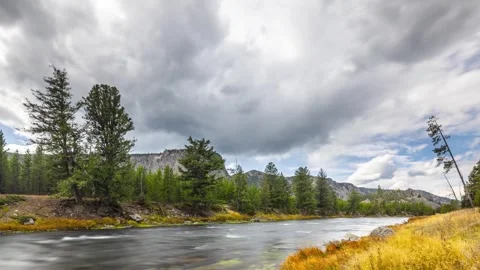 Time lapse of the clouds over the landscape of Yellowstone 動画素材 302329642
