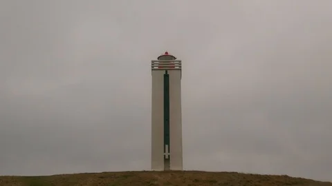 Time Lapse of Clouds Over a Lighthouse in Iceland Video stock 126199045