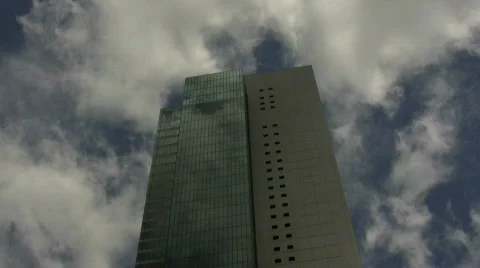 Time Lapse Of Clouds Over Modern Tower Video stock 729305