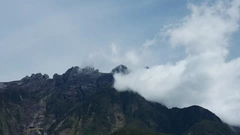 Time lapse of clouds over mount kinabalu Stock Footage 300849952