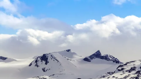 Time lapse of clouds over mountain top Stock Footage 43222376