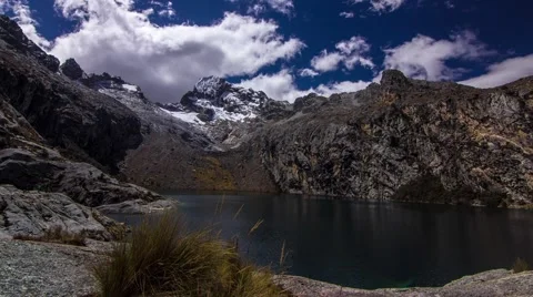 Time lapse of clouds over mountain range and lake, Peru Stock Footage 62388931