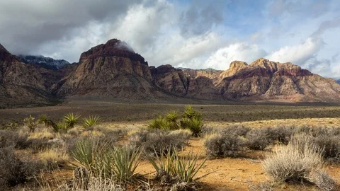 Time Lapse of Clouds Over Mountain Range in Red Rock Canyon Stock Footage 107946974