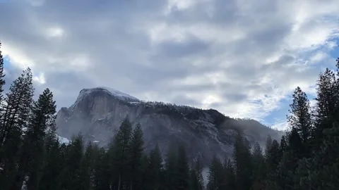 Time Lapse of Clouds Over a Mountain in Yosemite National Park Stock Footage 133971047