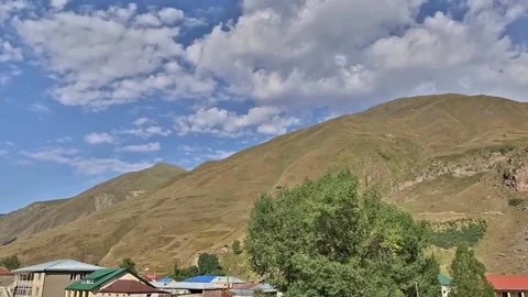 Time lapse clouds over the mountain Stock Footage 151010107