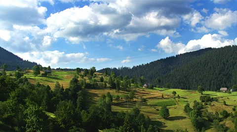 Time lapse of clouds over mountains Stock Footage 64656007