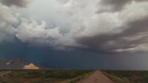 Time lapse of clouds over the mountains, Apache junction, Superstition wildernes Stock Footage 139785473