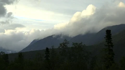 Time lapse of clouds over mountains Stock Footage 221722589