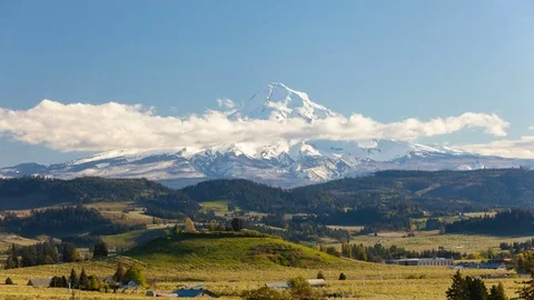 Time lapse of clouds over Mt. Hood and pear orchards in Hood River OR springtime Stock Footage 75487931