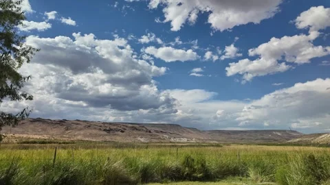 Time-Lapse of Clouds Over a Nevada Desert Wetland Stock Footage 314934747