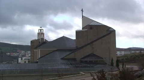 Time lapse on clouds over newish catholic church Stock Footage 37557006