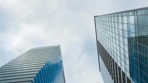 Time Lapse of clouds over office buildings in Tokyo, Japan Stock Footage 145504194