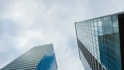 Time Lapse of clouds over office buildings in Tokyo, Japan Stock Footage 145504200