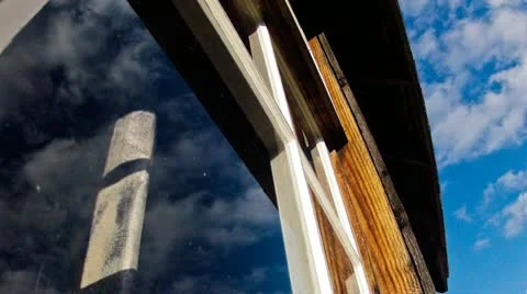 Time lapse of clouds over old schoolhouse Stock Footage 11631019