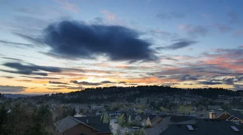 Time lapse of clouds over residential homes in Happy Valley, OR at sunset 4k UHD Stock Footage 61279191