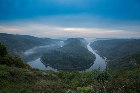 Time-lapse of clouds over River Saar at dusk Stock Footage 116269616