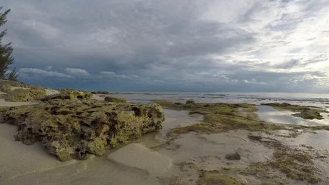 Time lapse of clouds over rock pools at Deals Pointe, Eleuthera, The Bahamas 4K Stock Footage 94913650