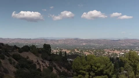 Time lapse of clouds over the San Fernando Valley in Los Angeles Video stock 346774334