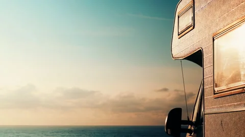 Time lapse clouds over sea and camper camping on shore, Spain. Stock Footage 127655395