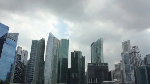 Time lapse of clouds over Singapore skyscrapers Stock Footage 24638331