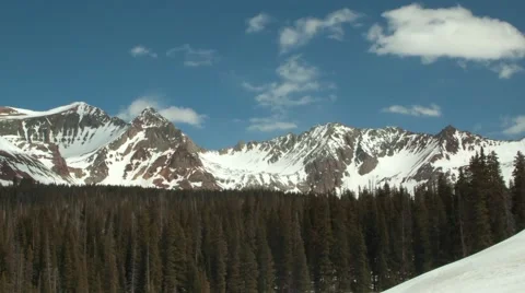 Time-lapse of clouds over snowy Colorado mountains Stock Footage 62441938
