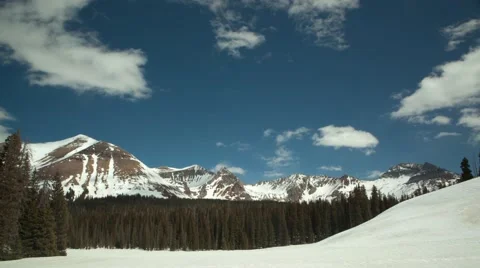 Time-lapse of clouds over snowy Colorado mountains Stock Footage 62441986