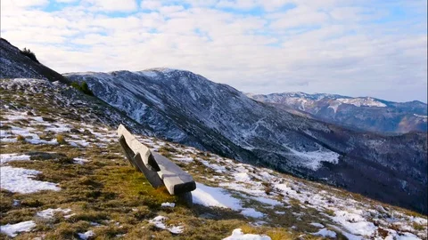 Time lapse clouds over snowy mountain Video stock 70593155