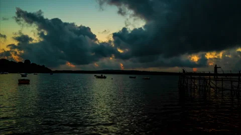 Time Lapse Clouds over sunrise on the lake Stock Footage 158466555