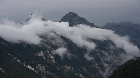 Time-lapse of Clouds Over Swiss Mountains near Eiger Summit - Switzerland Stock Footage 80603501
