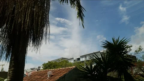 Time lapse clouds over Sydney homes in Cremorne 4K Stock Footage 305425280