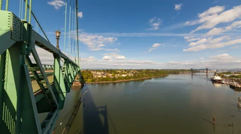 Time Lapse of Clouds Over Willamette River with St. Johns Bridge in Portland OR Video stock 51719471