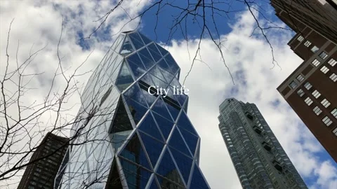 Time lapse of clouds passing across Hearst tower  動画素材 149466038