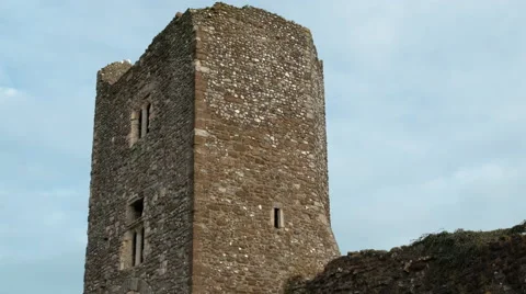 Time-lapse of clouds passing behind a tower of Dover Castle Stock Footage 52234512