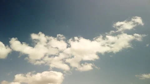 Time lapse of clouds passing. Blue sky white clouds. Cumulus cloud sky timelapse Stock Footage 139452334
