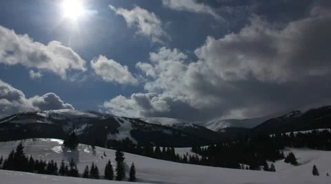 Time-lapse of clouds passing by over winter landscape in Carpathian, Full HD Stock Footage