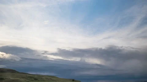 Time Lapse of Clouds Passing Over Rolling Hills Stock Footage 55809876