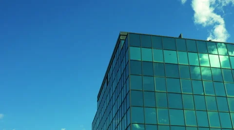 Time lapse of Clouds passing over corporate business buildings Stock Footage 62902893