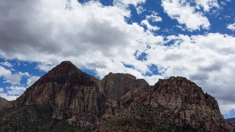 Time Lapse of Clouds Passing Over Mountain Stock Footage 108872796