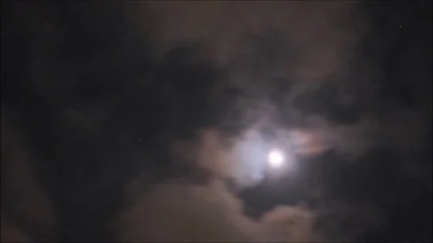 Time Lapse of Clouds Passing Over the Moon Stock Footage 116429323