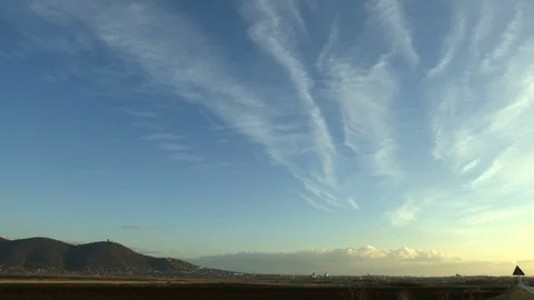Time lapse clouds passing over Stock Footage 123862980