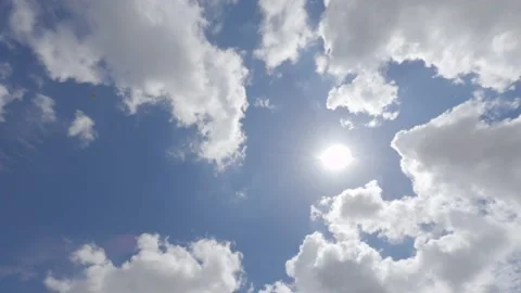 Time Lapse Clouds Passing Over Sun Stock Footage 169750764
