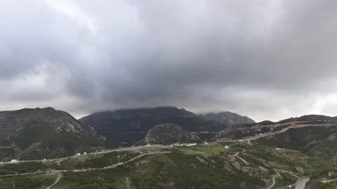 Time lapse of clouds passing over mountains in Morocco Stock Footage 219678644