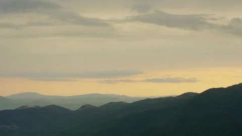 Time lapse of clouds passing over Mount Cook during a sunrise Stock Footage 281795325