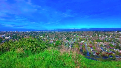Time-lapse of clouds passing over Victoria Canada suburbs from Mount Tolmie Stock Footage 332615646